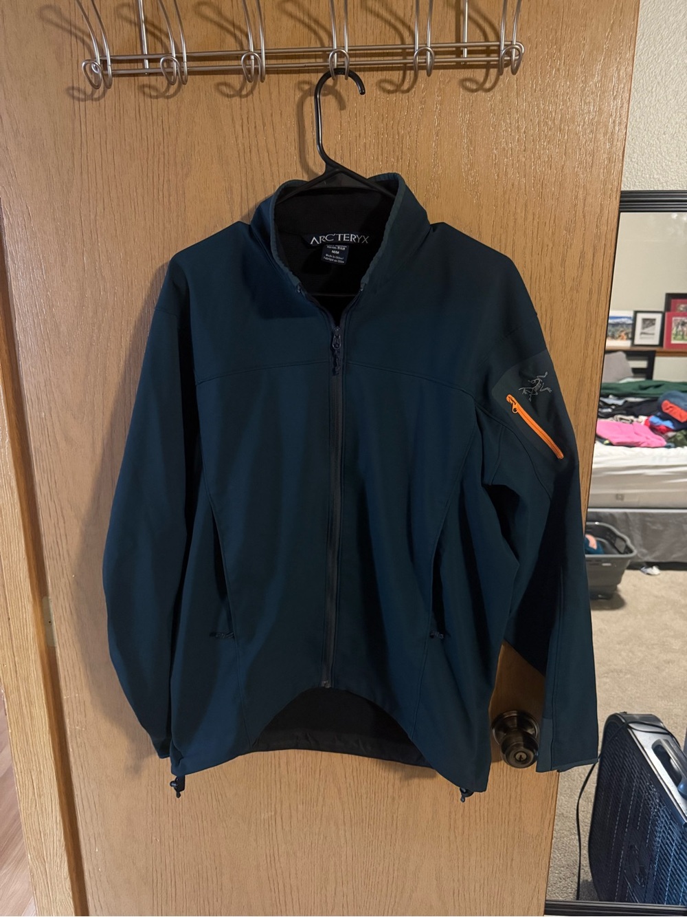 Arc'teryx Men's Teal Softshell Jacket with Orange Zip Accent